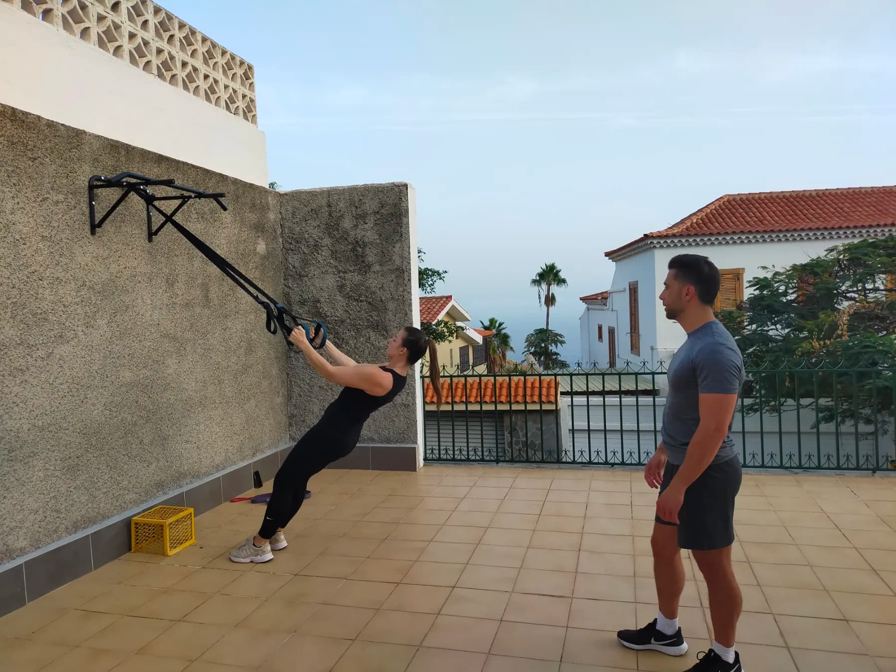 Sunny fitness terrace and open-air activity space.
